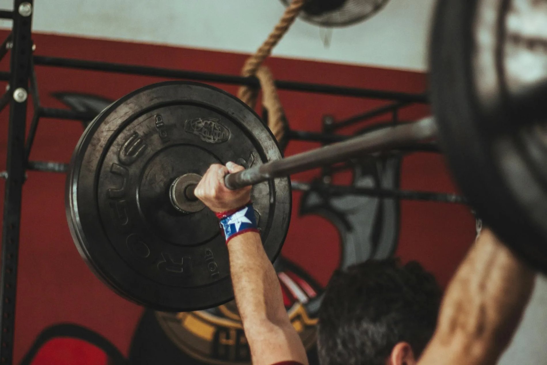 Man lifting weights for bodybuilding