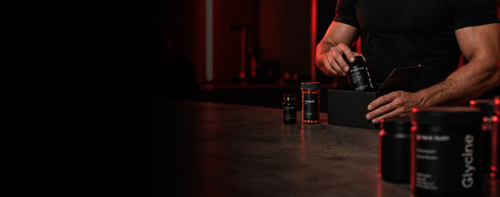 Marek Health supplement bottles on a counter as a client packs a treatment shipment